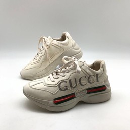 Белые кроссовки Gucci Rhyton