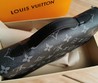 Кошелек кожаный Louis Vuitton черный с ручкой и орнаментом LV 22х12