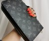 Кошелек кожаный Louis Vuitton черный с ручкой и орнаментом LV 22х12