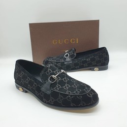 Мужские лоферы Gucci черные с орнаментом GG