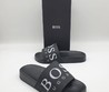 Мужские шлепанцы Hugo Boss 2021-2022 черные с белым логотипом