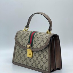 Женская сумка Gucci 25х18 бежевая с орнаментом GG