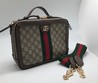 Женская сумка Gucci 25х19 бежевая с орнаментом GG