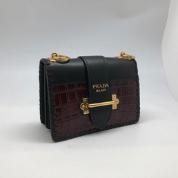 Женская сумка Prada Cahier кожаная бордовая
