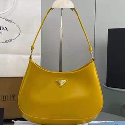 Женская сумка Prada Cleo кожаная желтая