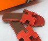 Женские шлепанцы Hermes оранжевые с коричневой подошвой