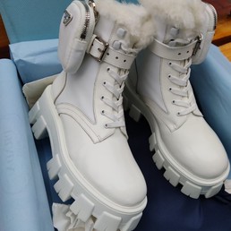 Женские зимние ботинки Prada кожаные белые