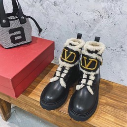 Женские зимние ботинки Valentino на меху черные кожаные