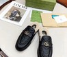 Женские мюли Gucci с эмблемой GG черные кожаные