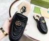 Женские мюли Gucci с эмблемой GG черные кожаные
