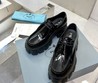 Женские ботинки Prada Monolith черные кожаные лакированные
