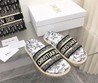 Женские шлепанцы Christian Dior белые с черным рисунком кожаные