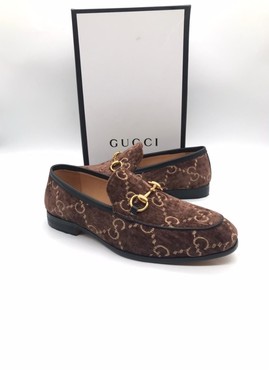 Мужские лоферы Gucci 2022-2023 коричневые с орнаментом GG