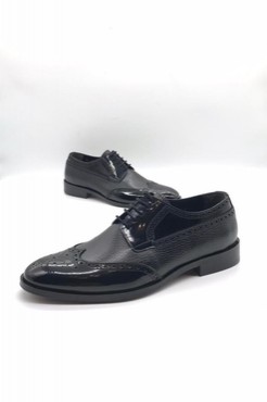 Мужские туфли Brioni 2022-2023 черные кожаные с перфорацией