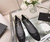 Кожаные балетки Chanel черные c глянцевым носом