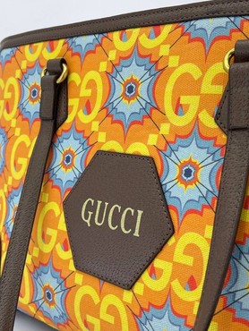 Женская сумка Gucci оранжевая 45x27 с орнаментом GG