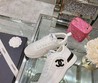 Женские летние кроссовки Chanel 2022 белые с черным логотипом