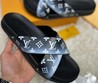 Мужские шлепанцы Louis Vuitton 2022-2023 черные с белым орнаментом LV