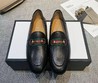 Женские лоферы Gucci черные кожаные с зеленым элементом