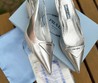 Женские туфли-лодочки Prada серебристые кожаные