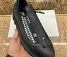 Мужские кроссовки Givenchy 2022-2023 черные кожаные с замком и белым рисунком