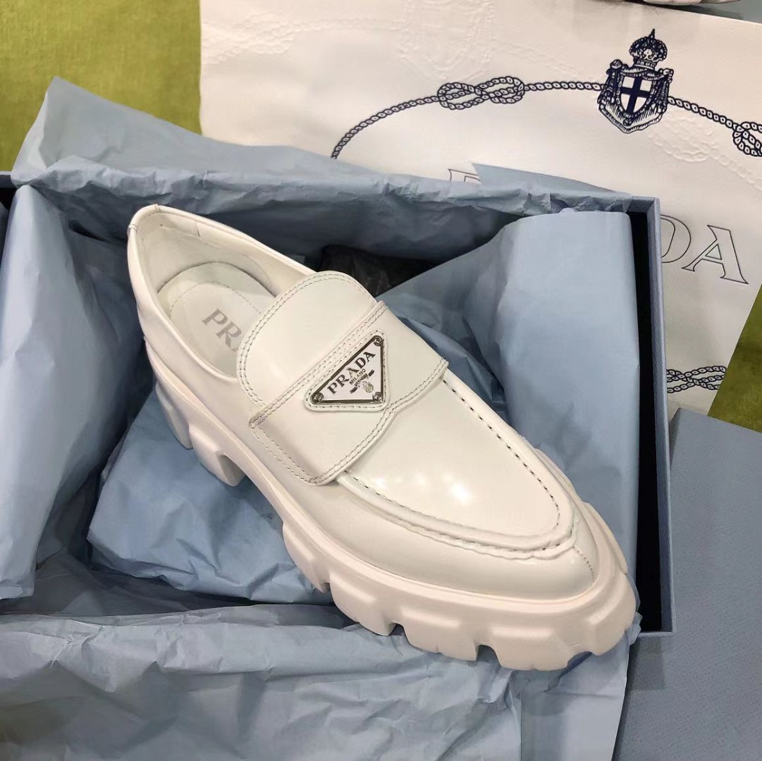 Женские высокие ботинки Prada 2022 белые кожаные