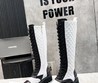 Женские осенние сапоги Chanel 2022 белые с черным кожаные фактурные