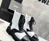 Женские ботинки Chanel 2022 белые с черным кожаные фактурные