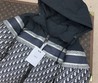 Женский пуховик Christian Dior черный с белым орнаментом