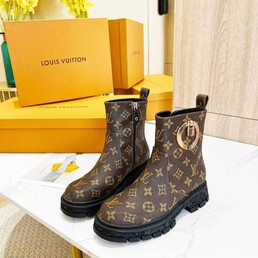 Женские ботинки кожаные Louis Vuitton 2022 коричневые без шнурков и с орнаментом
