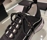 Женские кроссовки Chanel 2022 черные с белой подошвой