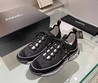 Женские кроссовки Chanel 2022 черные с белой подошвой