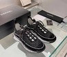 Женские кроссовки Chanel 2022 черные с белой подошвой