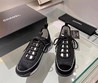 Женские кроссовки Chanel 2022 черные с белой подошвой
