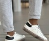 Женские зимние кеды Golden Goose 2022 белые с черной пяткой