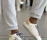 Женские зимние кеды Golden Goose 2022 белые с черно-белыми шнурками