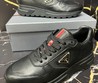 Мужские кожаные кроссовки Prada 2022 черные с красным логотипом