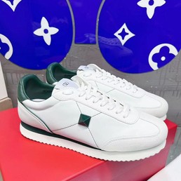 Женские кожаные кроссовки Valentino Garavani 2022-2023 белые с зелёным
