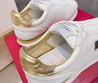 Женские кожаные кроссовки Valentino Garavani 2022-2023 белые с золотым