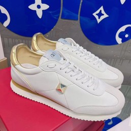 Женские кожаные кроссовки Valentino Garavani 2022-2023 белые с золотым