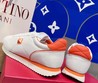 Женские кожаные кроссовки Valentino Garavani 2022-2023 белые с оранжевым