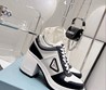 Женские кожаные кроссовки Prada 2022-2023 белые с черным
