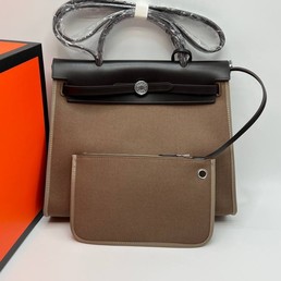 Женская кожаная сумка Hermes 2022-2023 коричневая с черным 31х26
