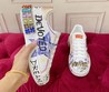 Женские кожаные кроссовки Dolce & Gabbana 2022-2023 белые с надписями