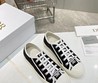 Женские текстильные кроссовки Christian Dior 2022-2023 черные с белым и камушками