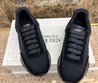 Мужские кожаные кроссовки Alexander McQueen 2022-2023 черные