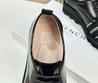 Мужские кожаные туфли Givenchy 2022-2023 черные с белым