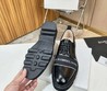 Мужские кожаные туфли Givenchy 2022-2023 черные с белым