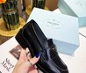 Женские кожаные лоферы Prada 2022-2023 черные