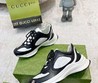 Женские кожаные кроссовки Gucci 2022-2023 черные с белым и фирменным принтом